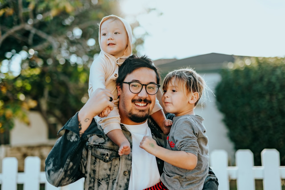 Maryland adoptive parents holding child hands
